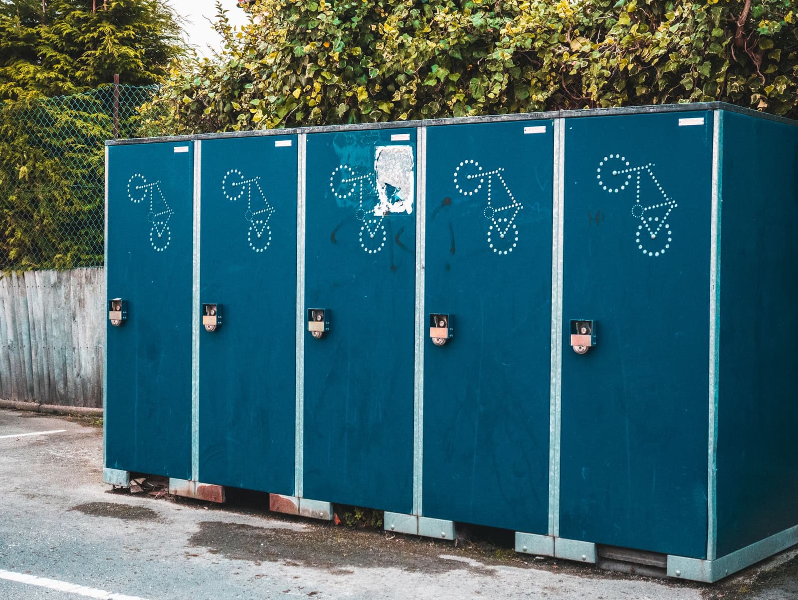 Portable restrooms positioned beside a roadway